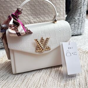 Elegant White Vegan Leather Handbag with Gold Accent